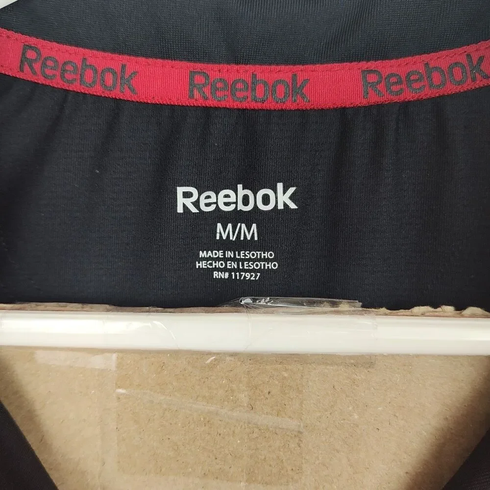 Reebok women's full-zip jacket, Medium, long sleeves, black w/ white accents VGC